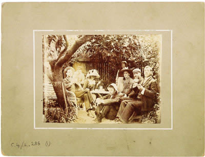 Photograph of Clark with his family in the garden