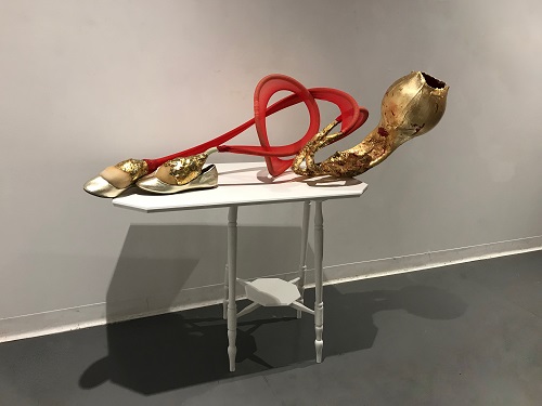 Janine Miller, 2018, There’s Life in the Old Girl Yet, Assemblage, recycled table, women’s stockings, fibre-fill, shoes, washing machine hose, plaster, paint, metallic gilding foils, dimensions variable.
