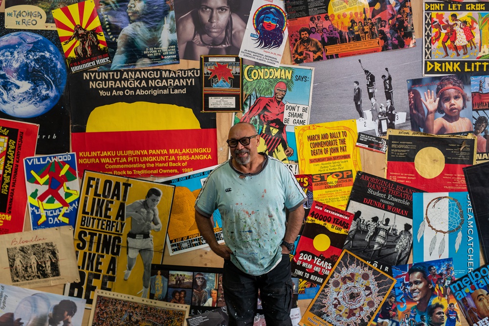 Artist Gordon Hookey standing in his studio.