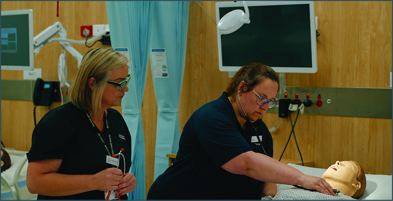 An adult learner nursing student in a nursing simulation activitiy