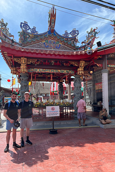 Music students visit a temple in Malaysia.