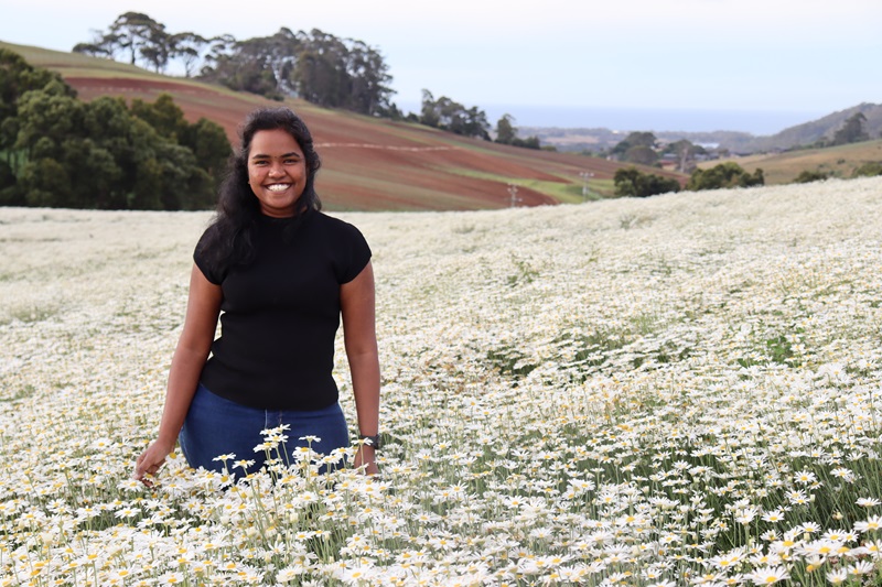 PhD candidate Pooja in a field of pyrethrum at the TIA Vegetable Research Facility in Tasmania