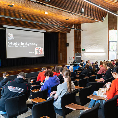 Future students attend Sydney open day presentation in the lecture theatre.