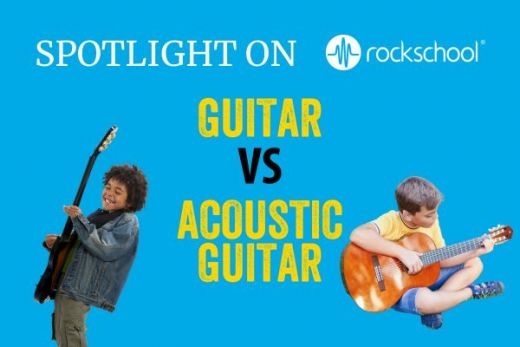 A boy with an afro playing an electric guitar and smiling while another boy with a hearing aid concentrates on playing an acoustic guitar.