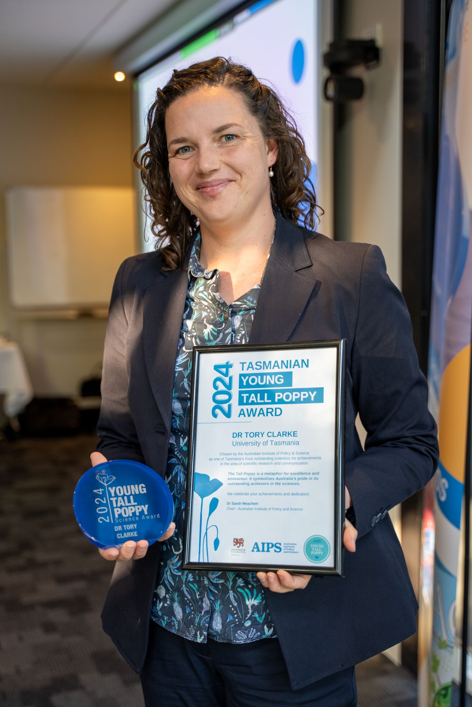 Dr Tory Clarke received a a Young Tall Poppy Award