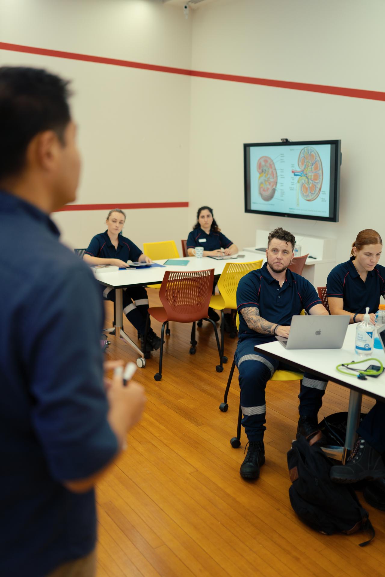 Kai Leemeijer and other Bachelor of Paramedicine students in class at the Rozelle Campus in Sydney.