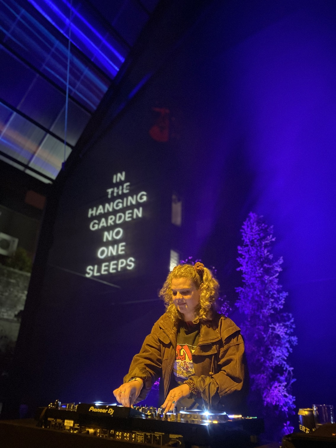 Amy Walsh performs as DJ Phemme at Hobart’s In The Hanging Garden music and cultural precinct. (Photo: Ella Lucy Photography)