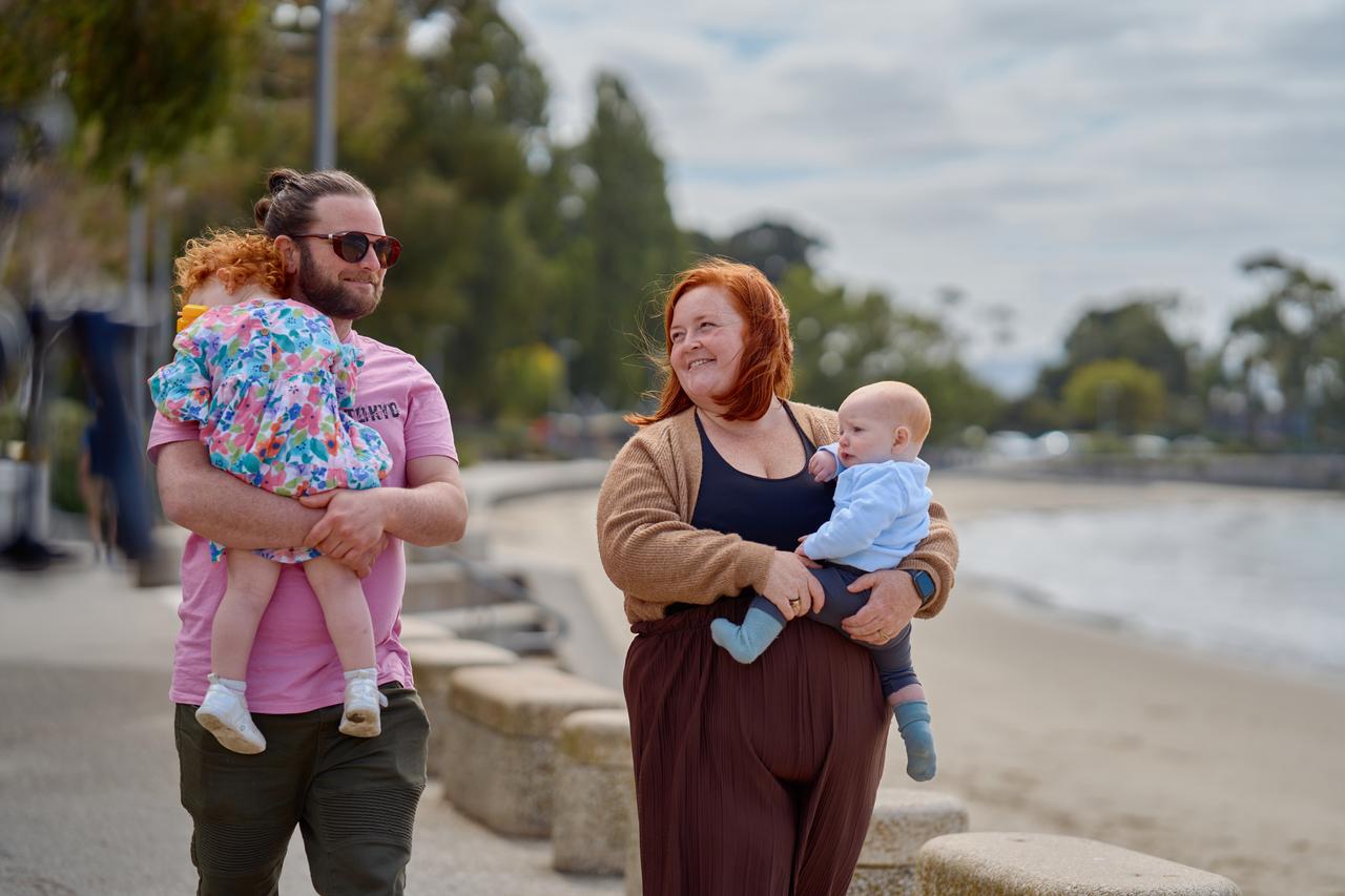 Molly and family on walking on beach