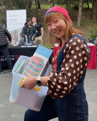 A student wearing a hand-knitted beanie