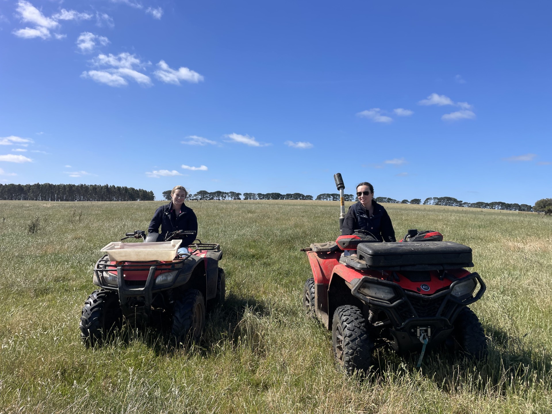 Tilly and her sister Bronte on quad bikes