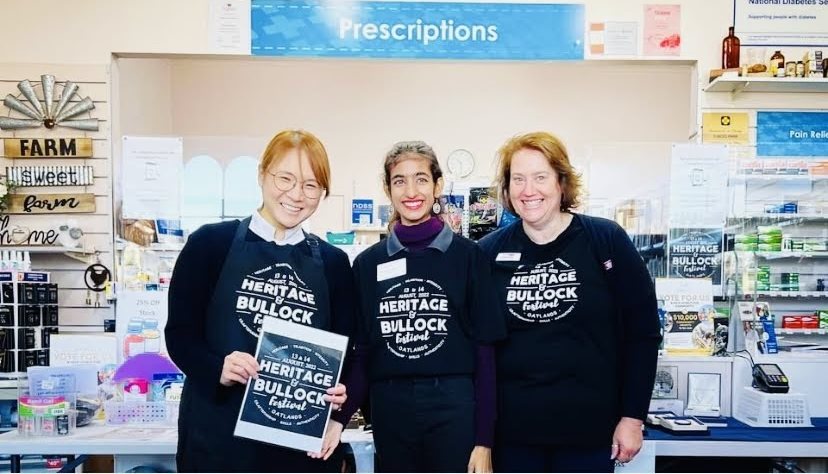 Gavithra Sivabalan smiling with the local Oatlands pharmacy team.