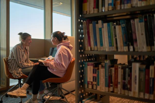 Burnie students chatting in library